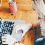 affiliate marketer behind a laptop